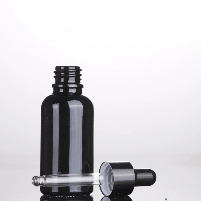 Luxury Pure Black Raw Material Essential Oil Bottle Cosmetic Packaging Glass Bottle with Dropper